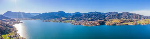 Drone Shot of the beautiful Lake Tegernsee in Bavaria Germany in front of the Alps. Very nice Holiday Resort