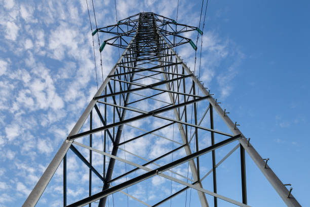 istock high voltage power line on metal poles 1084864678