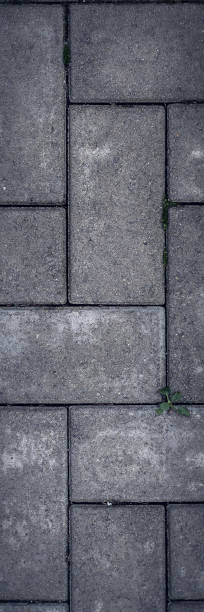 istock Background pavement, paving stone, brick, cobblestone, road, footpath. 1084864988