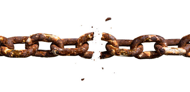 Weakest link breaking in old rusty chain photomontage Isolated on white background rusty chain. Middle link is falling apart. Photomontage rusted chain stock pictures, royalty-free photos & images