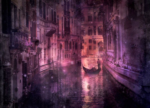 Gondolas tied up on the side of the Grand Canal in Venice. Across the lagoon we see the iconic shape of the Church of San Giorgio Maggiore