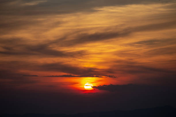 istock Sunset with Colorful dramatic sky in the countryside. 1084885420
