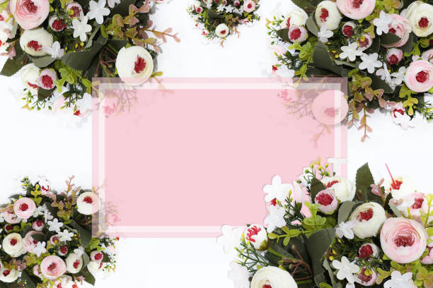 istock Festive flower composition with greeting card on the white  background. Overhead view - Image 1084893432