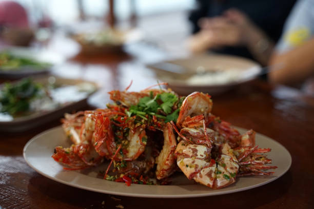 istock Fresh tiger prawn stir fried with chili and salt serving on the white plate 1084896548