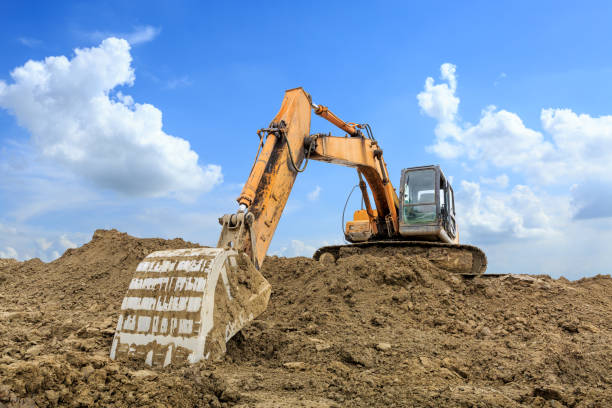 istock Excavator working at building site on sunny day 1084896968
