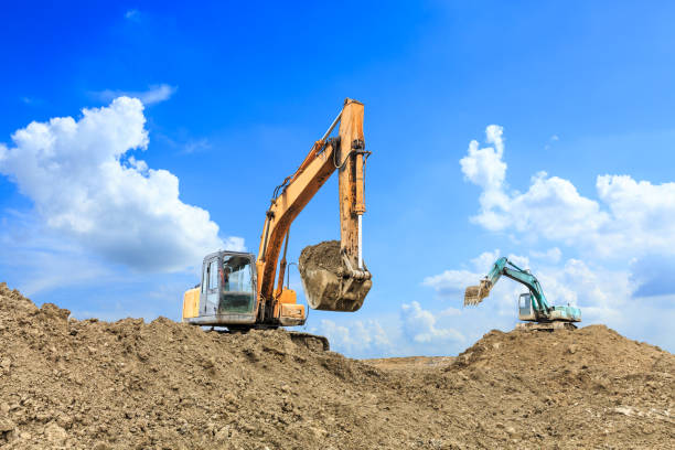 istock Excavator working at building site on sunny day 1084897060
