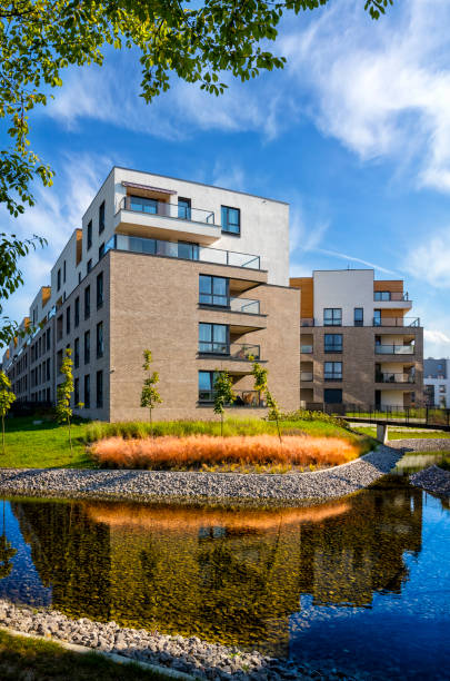 istock Modern complex of apartment buildings with small pond 1084900024