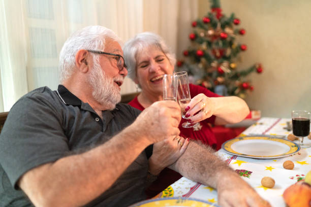 istock Seniors Celebrating Christmas Time at Home 1084900458