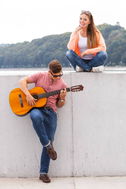 istock Man expressing his love by music. 1084903780
