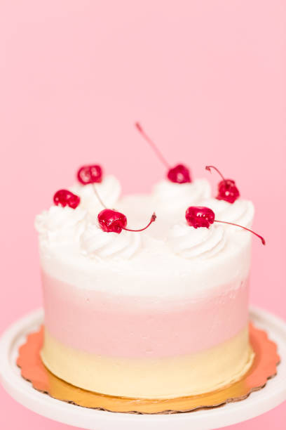 istock Birthday Spumoni cake on pink background. 1084915440