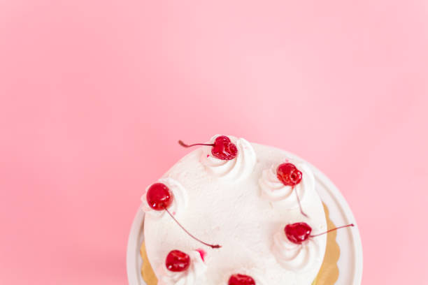 istock Birthday Spumoni cake on pink background. 1084915508
