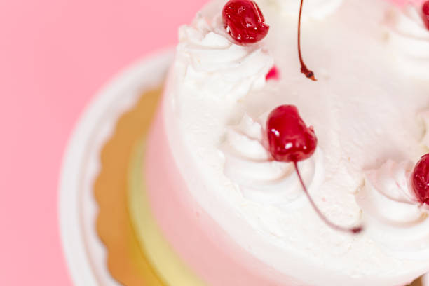 istock Birthday Spumoni cake on pink background. 1084915604