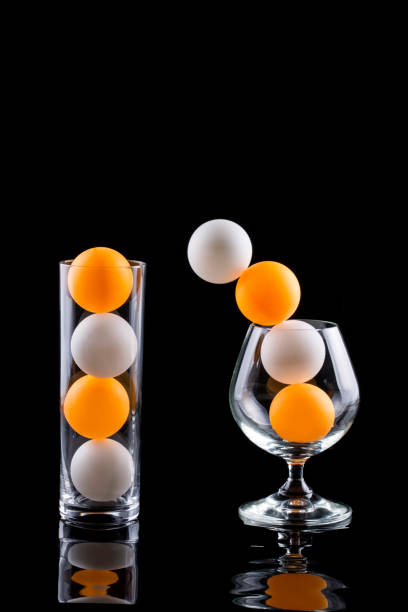 istock Still life with glasses, balls and reflection 1084916306