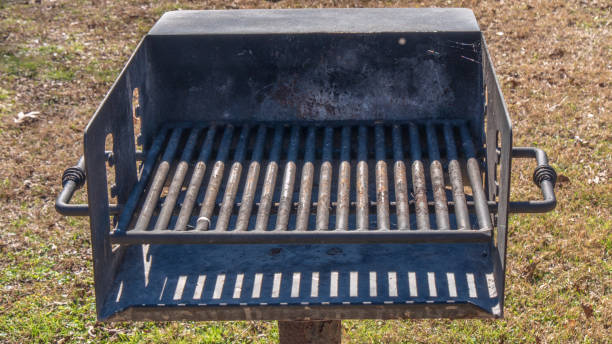 istock Public charcoal grill in a park 1084918134