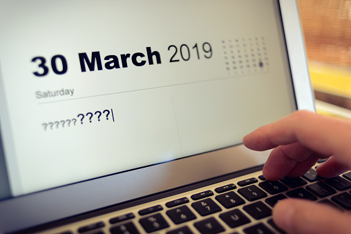 Brexit concept - Saturday 30 March 2019 should be the first day of Brexit, but what kind of Brexit, and what will happen? Calendar entry on a laptop with many question marks?????? How to prepare?