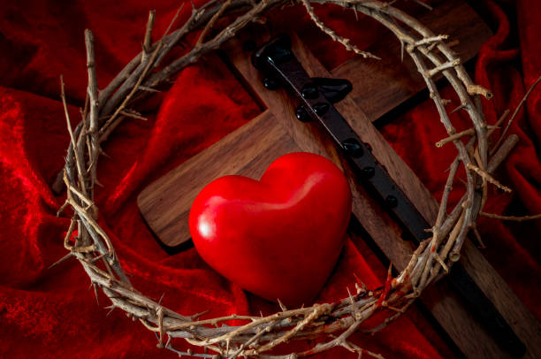 istock The expression of absolute love through the self sacrifice of Jesus Christ for the absolution of the original sin, christian holiday of Easter and Christianity concept with a heart and bleeding cross 1084924222
