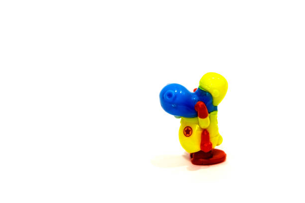 istock plastic toy isolated on white background little 1084933650