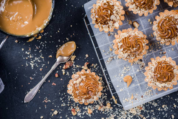 Baking salted caramel toffee cupcakes,sweet pastry food