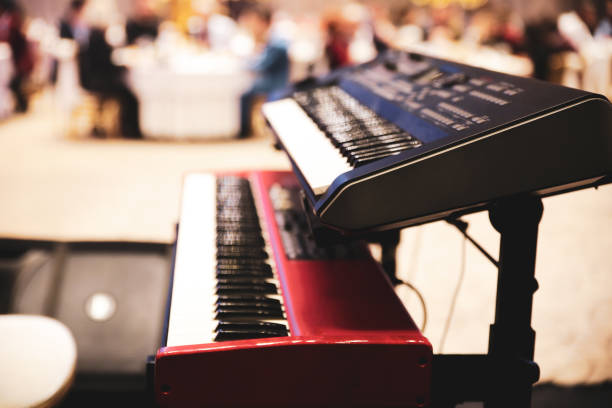 istock Piano keyboard background with selective focus. Warm color tone image 1084934180