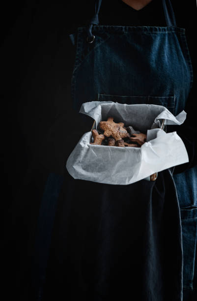 istock Gingerbread cookies in the shape of a doll 1084941480