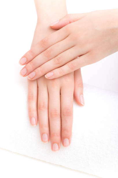 Beautiful female hands and nails in the beauty spa after beauty treatment.
