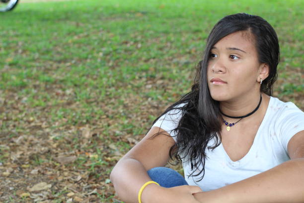 istock Lonely female teenager with copy space 1084965278