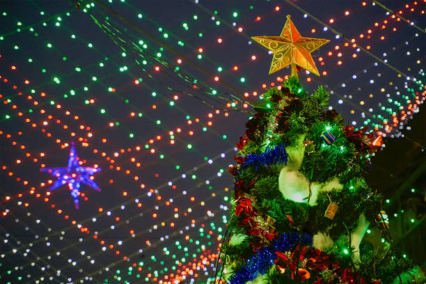 istock Big Christmas tree , decorated at night at Kolkata 1084971144