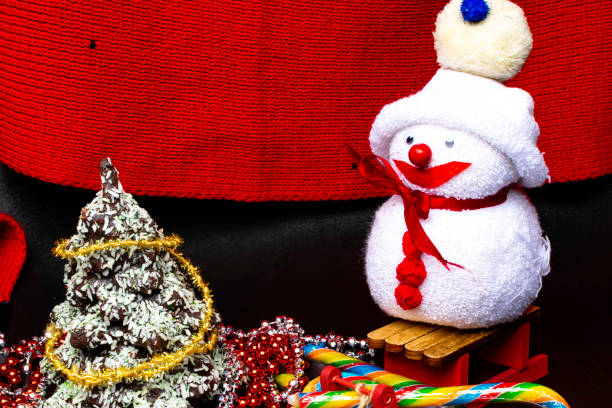 istock Snowman chocolate Christmas Tree Winter Holiday Concept 1084971592
