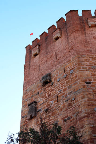 istock Bedesten Alanya fortress. Big red bricks tower. Turkey. 1084976138