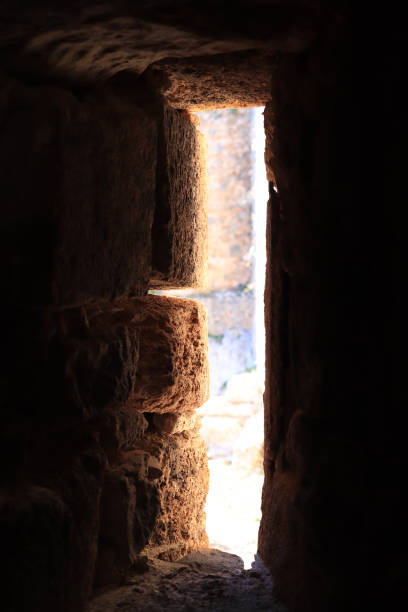 istock Ancient tower window sun light. Bedesten Alanya fortress. Turkey. 1084976162