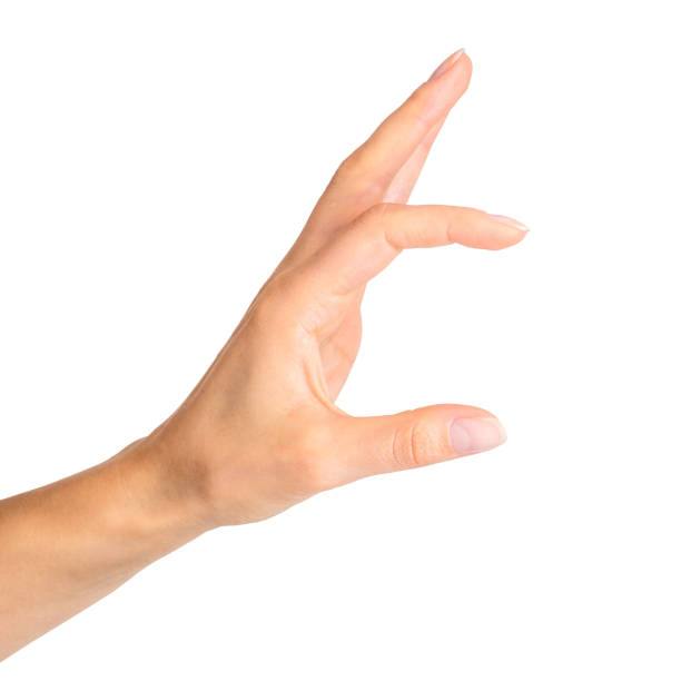 istock Woman hand holding something with two fingers 1084976688