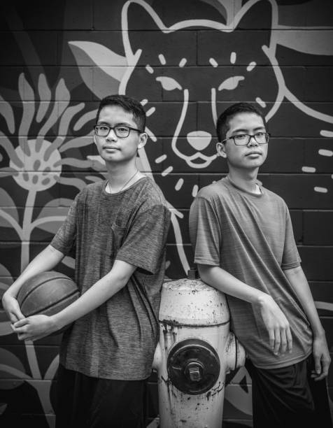istock Twins at basketball 1084977142