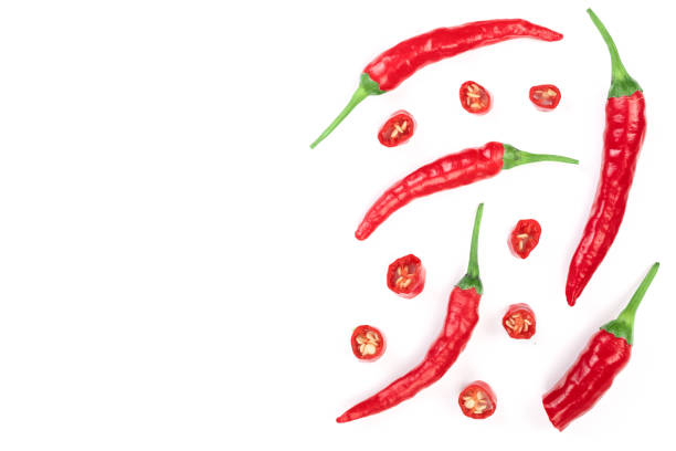 istock red hot chili peppers isolated on white background. Top view. Flat lay pattern 1084978266