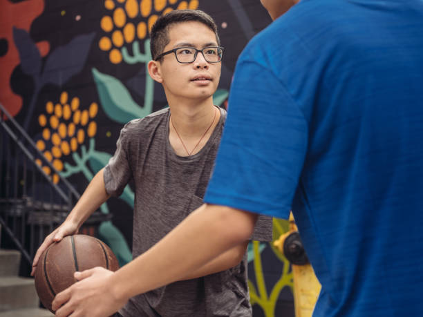 istock Twins at basketball 1084978268