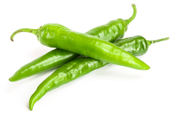 istock green hot chili peppers isolated on white background. Top view. Flat lay pattern 1084978282