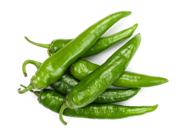 istock green hot chili peppers isolated on white background. Top view. Flat lay pattern 1084978284