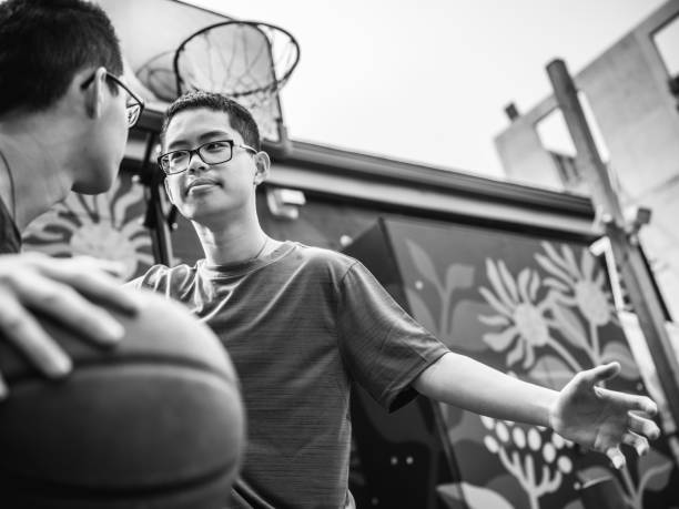 istock Twins at basketball 1084978378