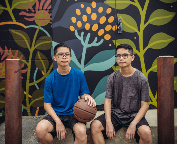 istock Twins at basketball 1084978844