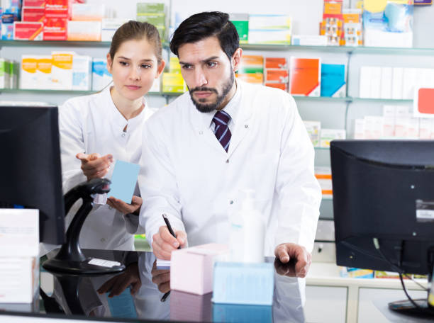 istock druggists are attentive stocktaking medicines 1084979634