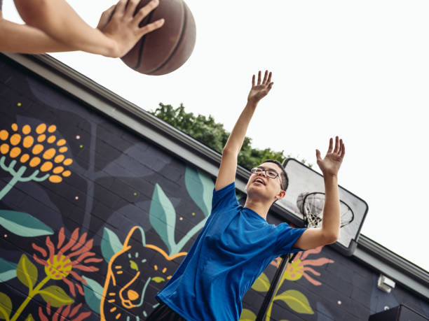 istock Twins at basketball 1084979702
