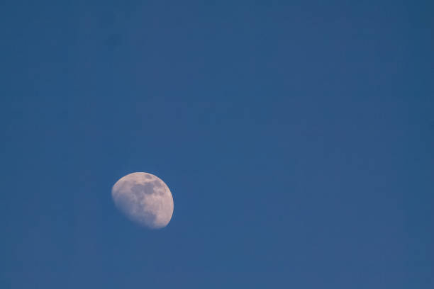 istock moon in evening time on beautiful natural blue sky background 1084987220