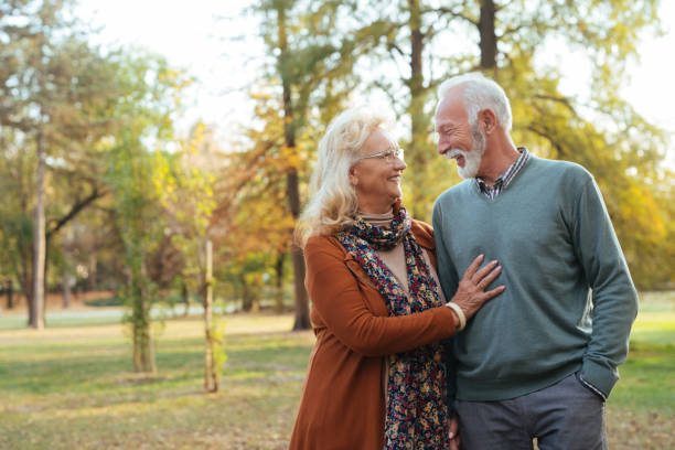 istock Senior couple taking a walk in the park 1084987316