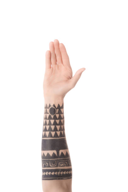 istock partial view of tattooed man hand isolated on white 1084988608
