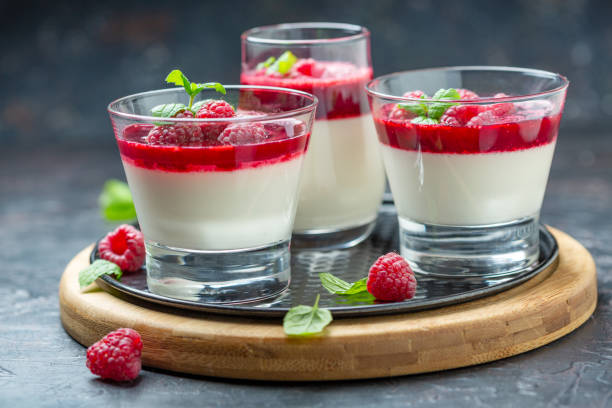 istock Panna cotta with berry sauce, raspberries and fresh mint. 1085005816