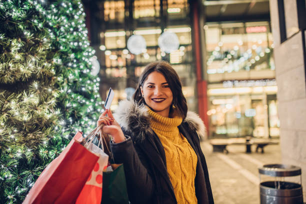 istock Joyful girl with credit card 1085008588