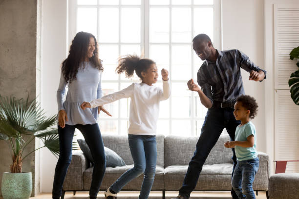 istock Happy African American having fun together indoors 1085009306