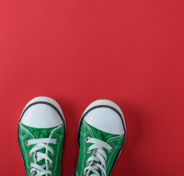 istock pair of green children's shoes 1085014866