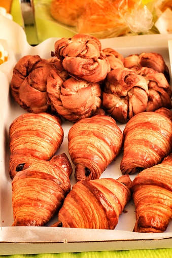 Croissants for sale at an eco-friendly flea market in Elche, Spain