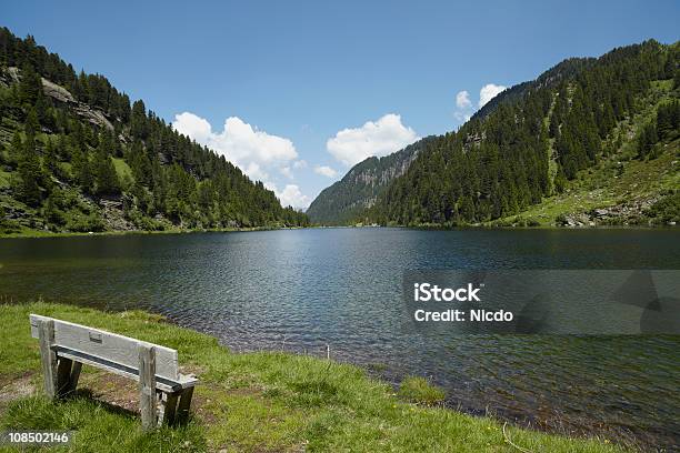 Alpine Lake Stock Photo - Download Image Now - Bench, Cloudscape, Color Image