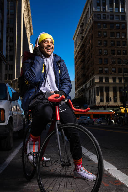 istock Bike Messenger Listening to Instructions 1085027412